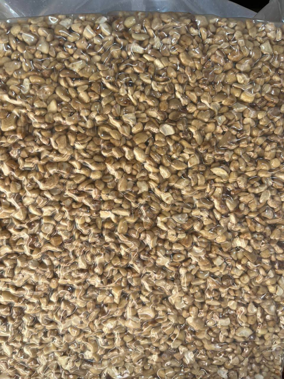 Close-up of kernel pieces in a vacuum-sealed bag